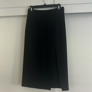 Babaton black slit knee midi skirt